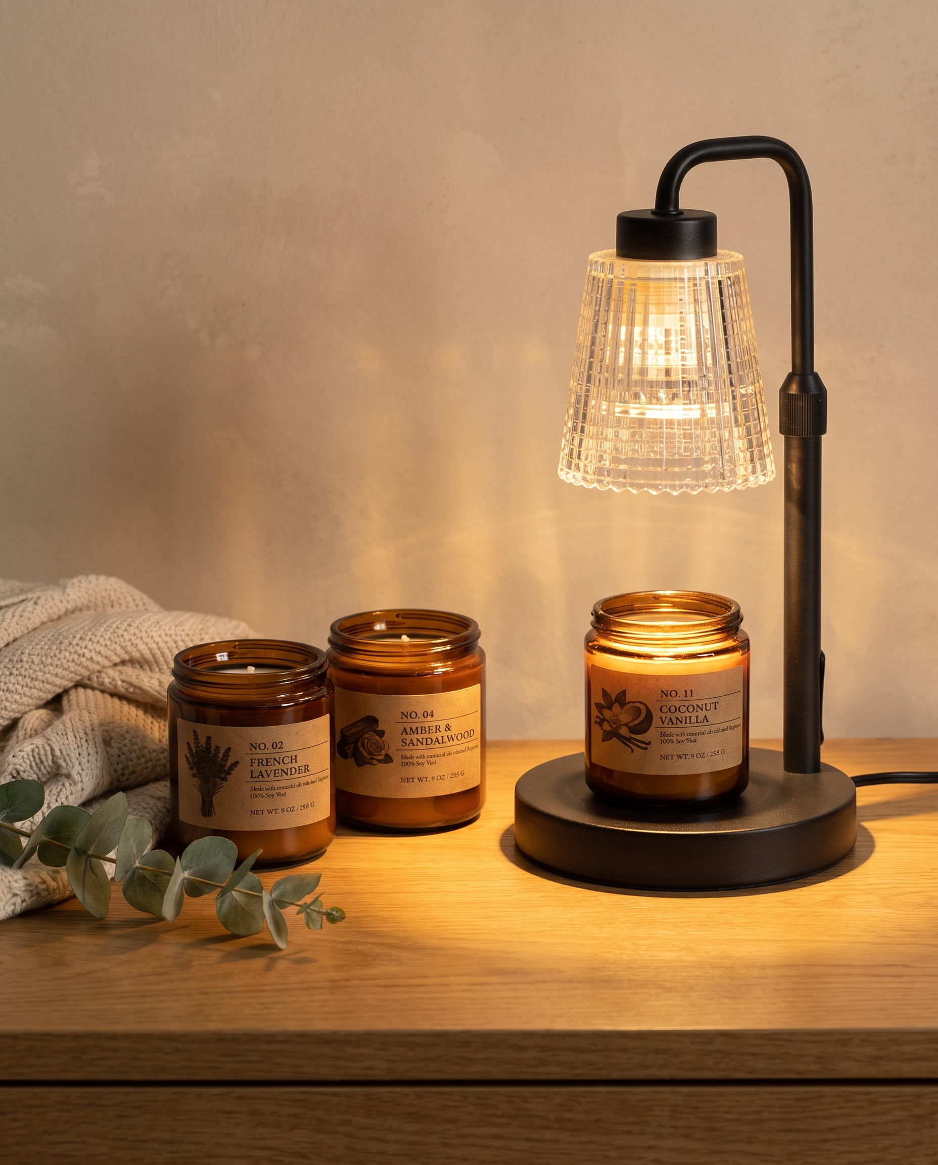 Hearth amber candles with the Ember warmer glowing — lifestyle