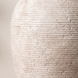 Willa vase ribbed ceramic texture, close-up on white