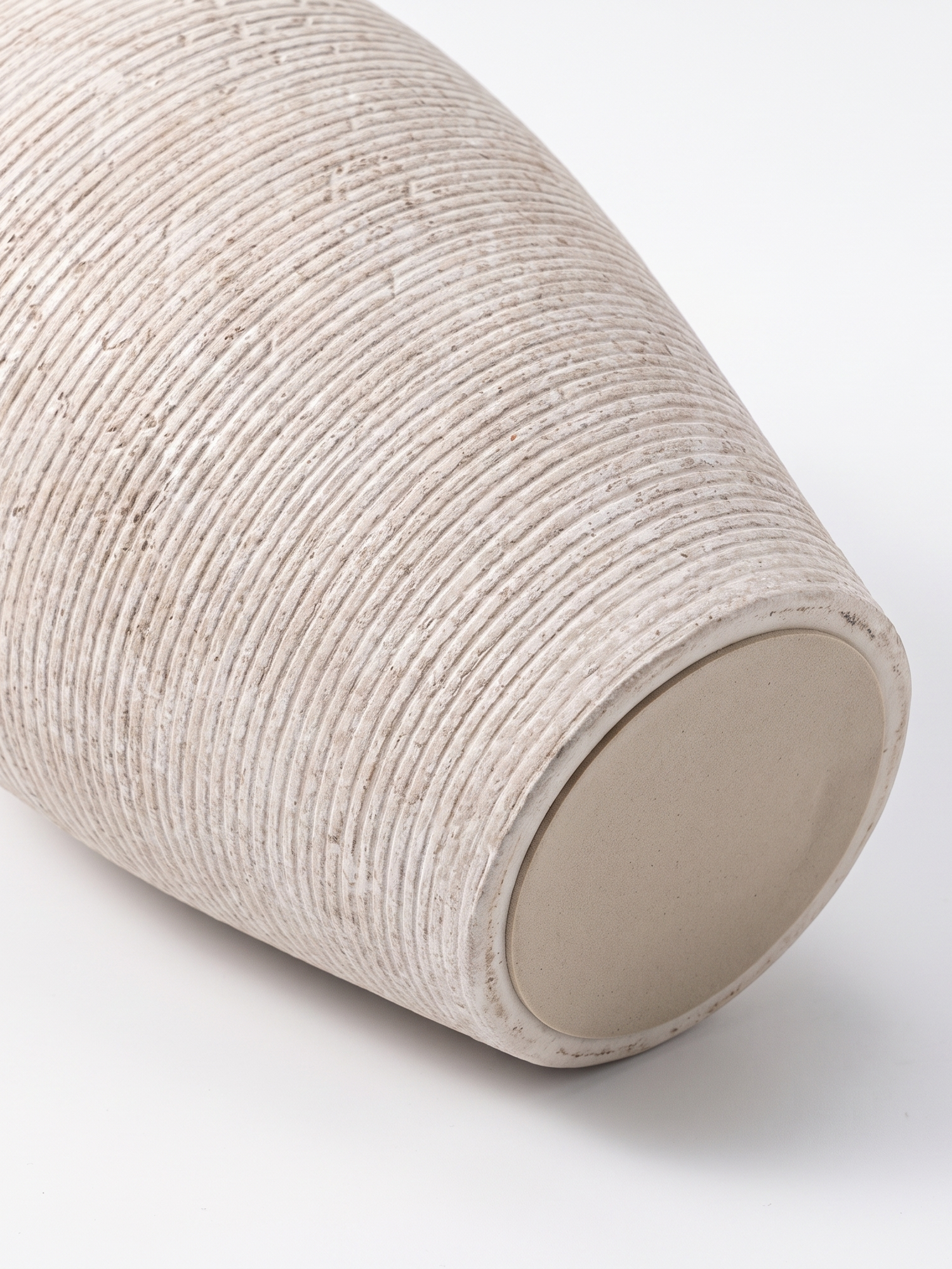 Willa vase tapered base detail, close-up on white