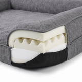 Cove dog bed memory foam layers and non-slip base, close-up on white