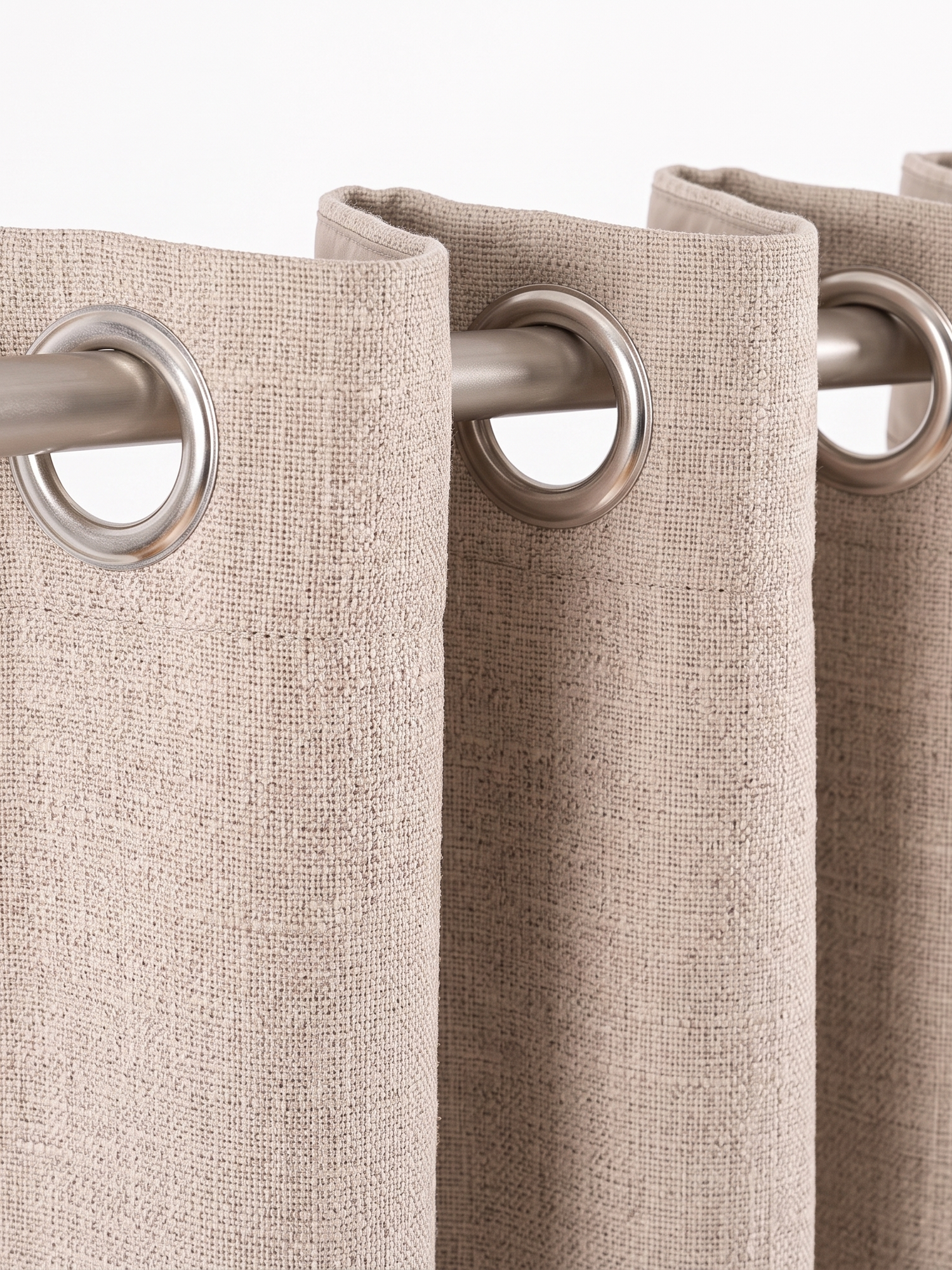 Linden curtain grommet header, close-up on white