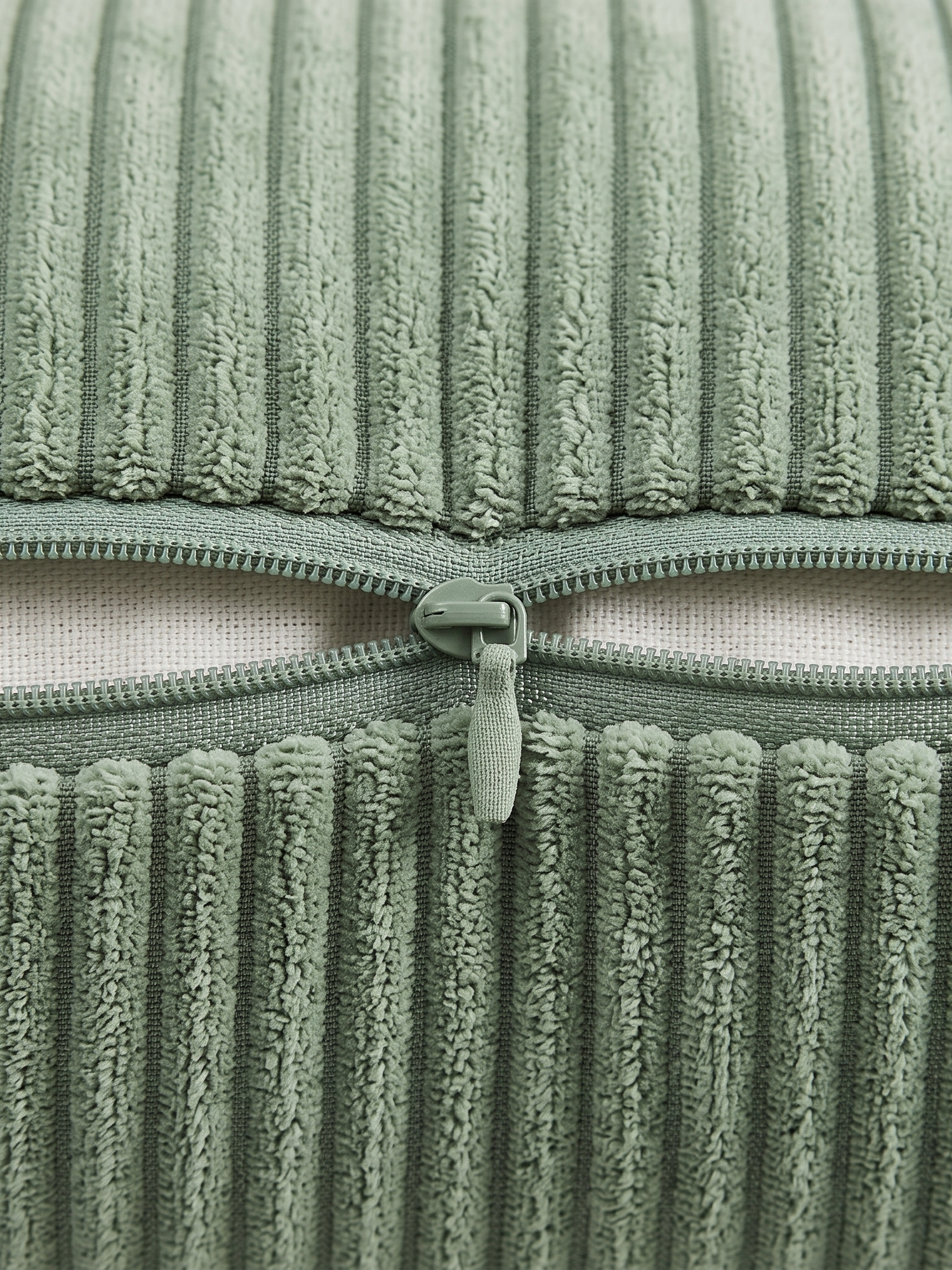 Sorrel pillow cover hidden zip closure, close-up on white