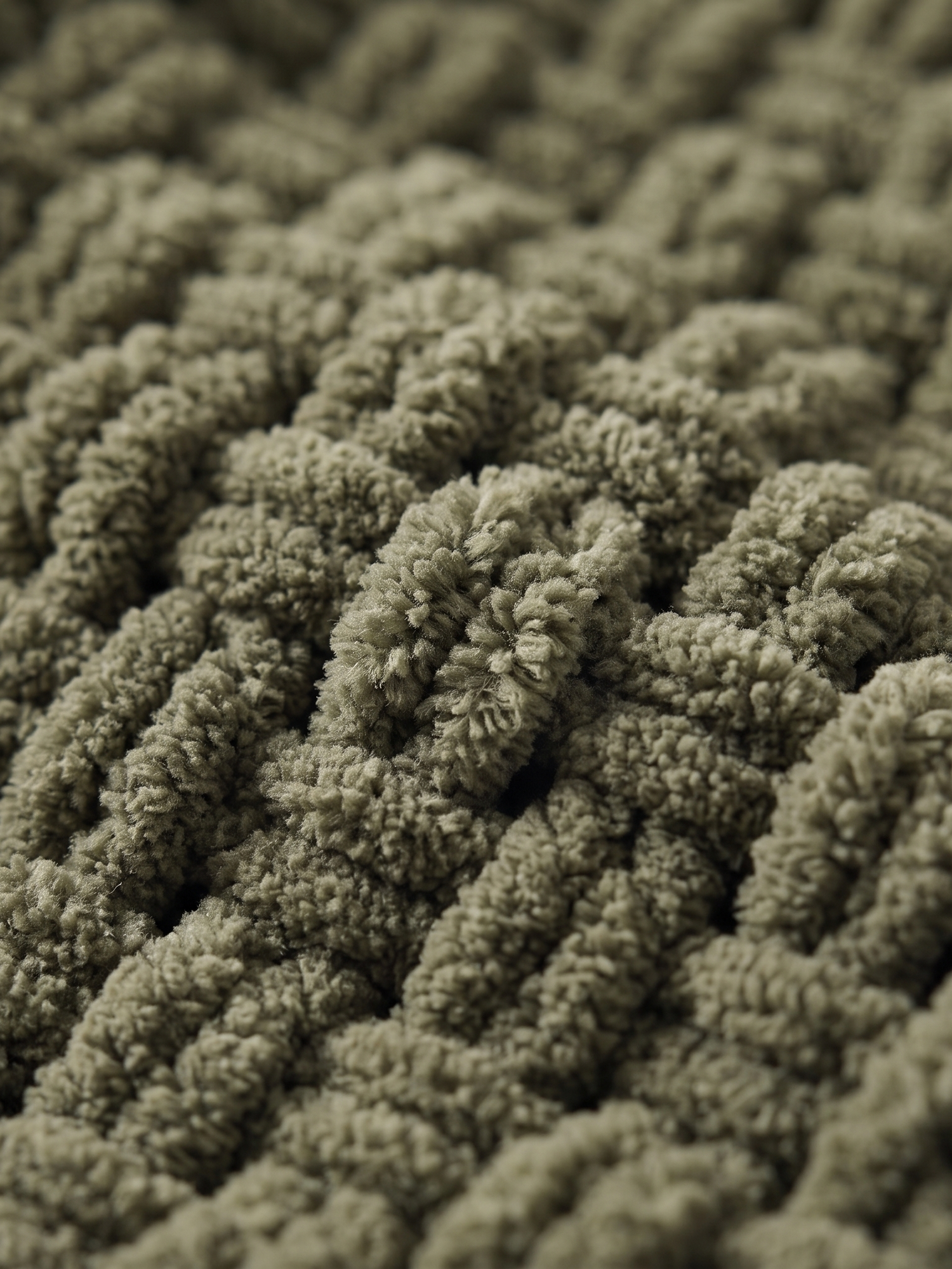 Fern chunky chenille knit texture, close-up on white