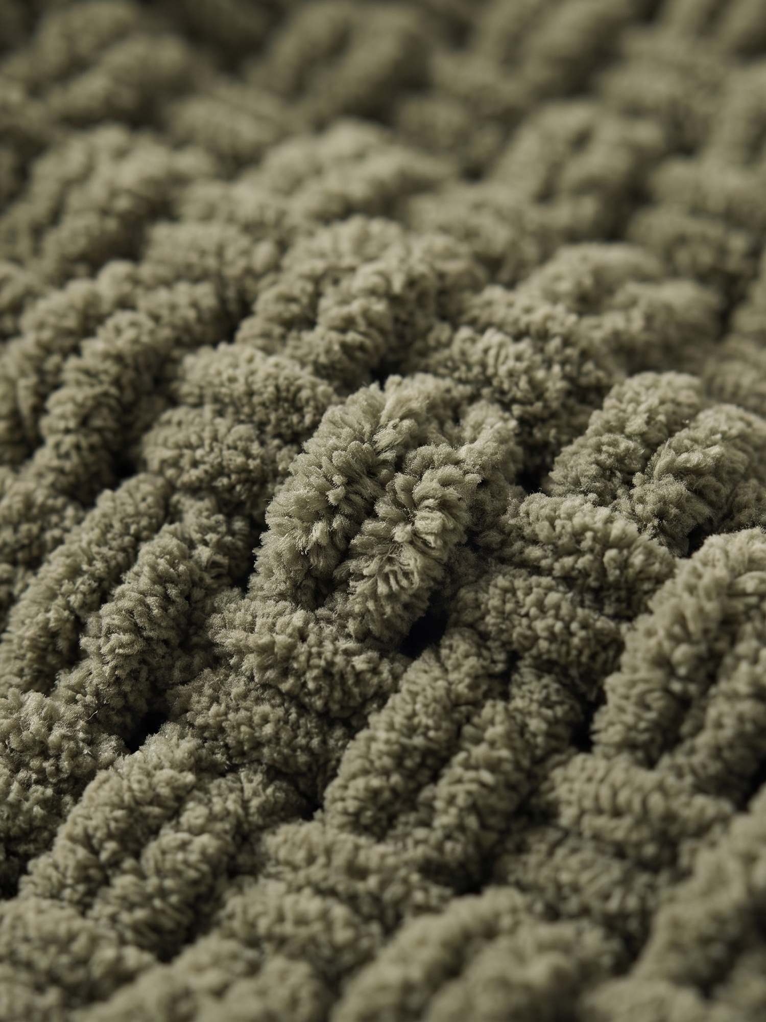 Fern chunky chenille knit texture, close-up on white