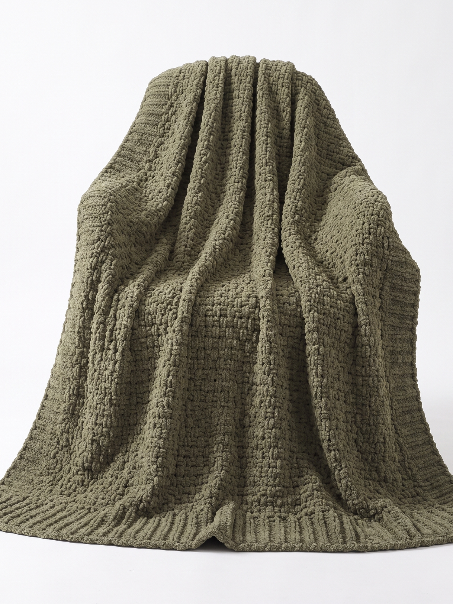 Fern olive knit throw draped, studio on white