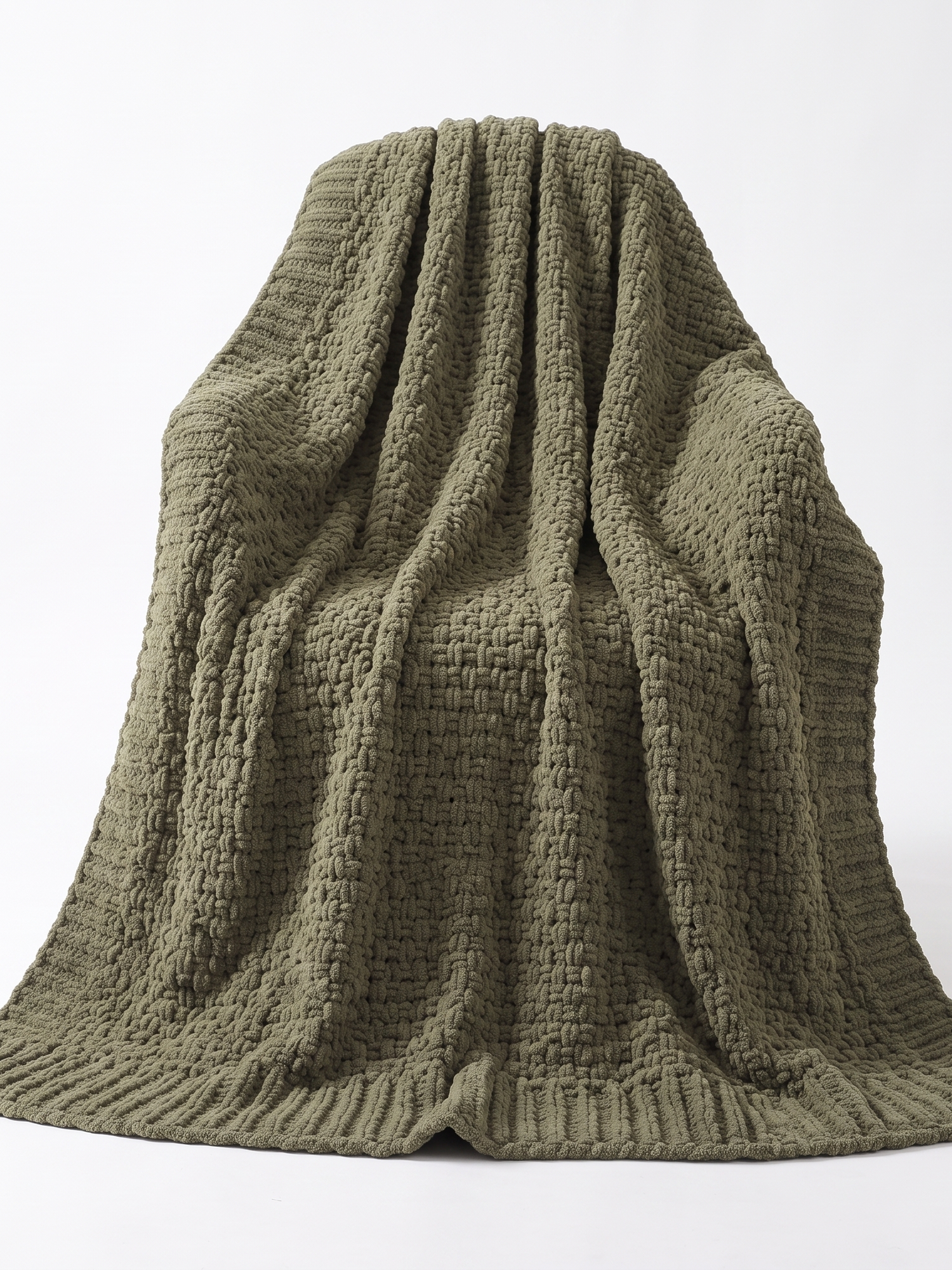 Fern olive knit throw draped, studio on white