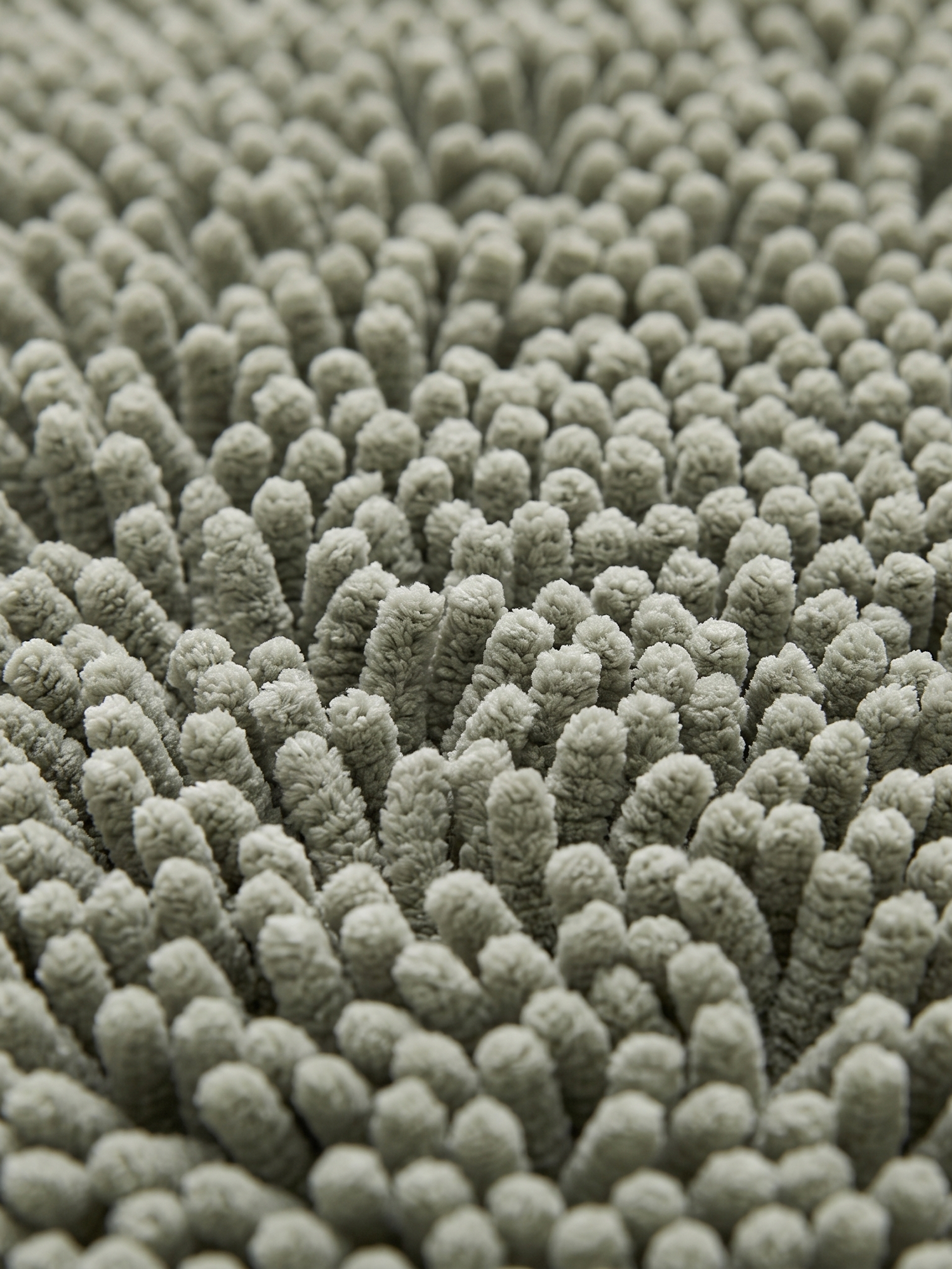 Pebble chenille shag pile texture, close-up on white