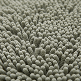 Pebble chenille shag pile texture, close-up on white