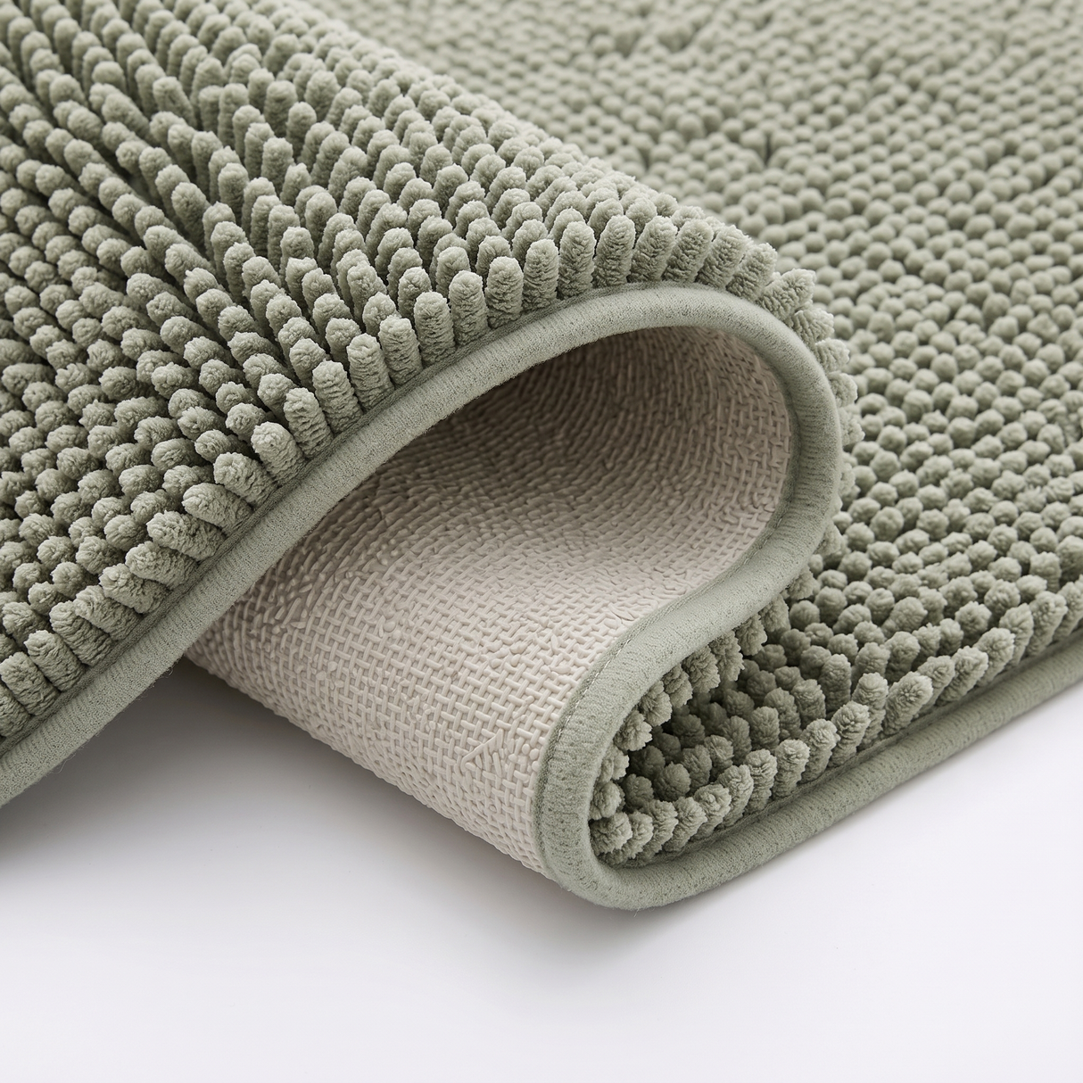 Pebble bath mat non-slip backing, close-up on white