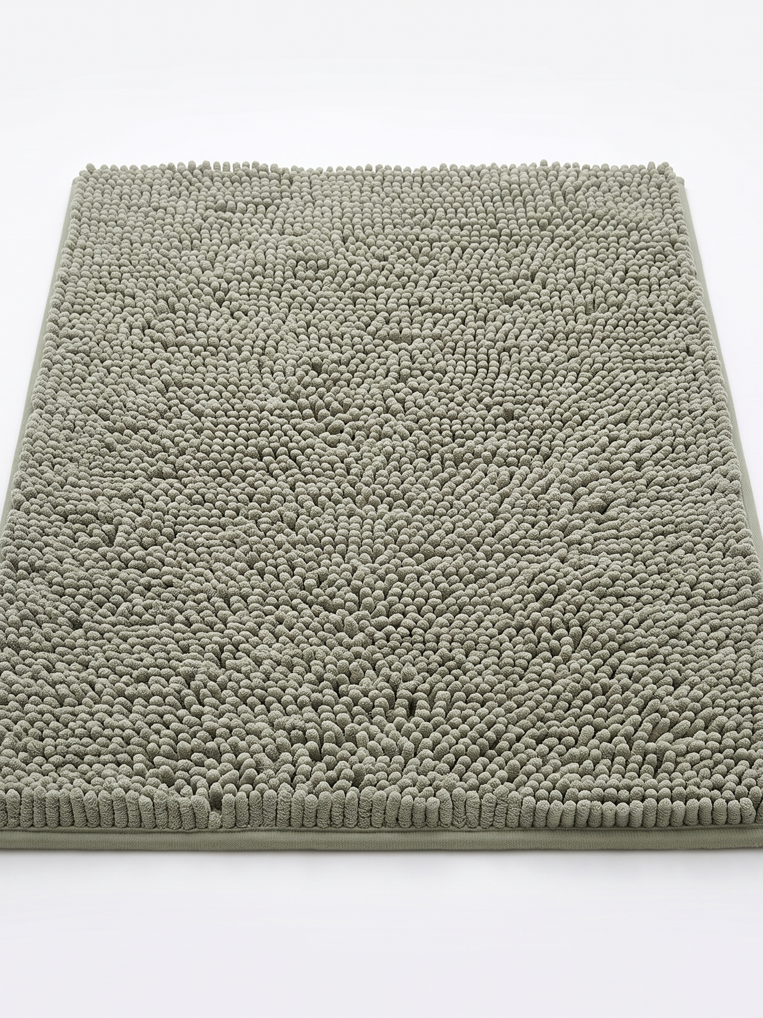 Pebble single sage chenille bath mat, studio on white