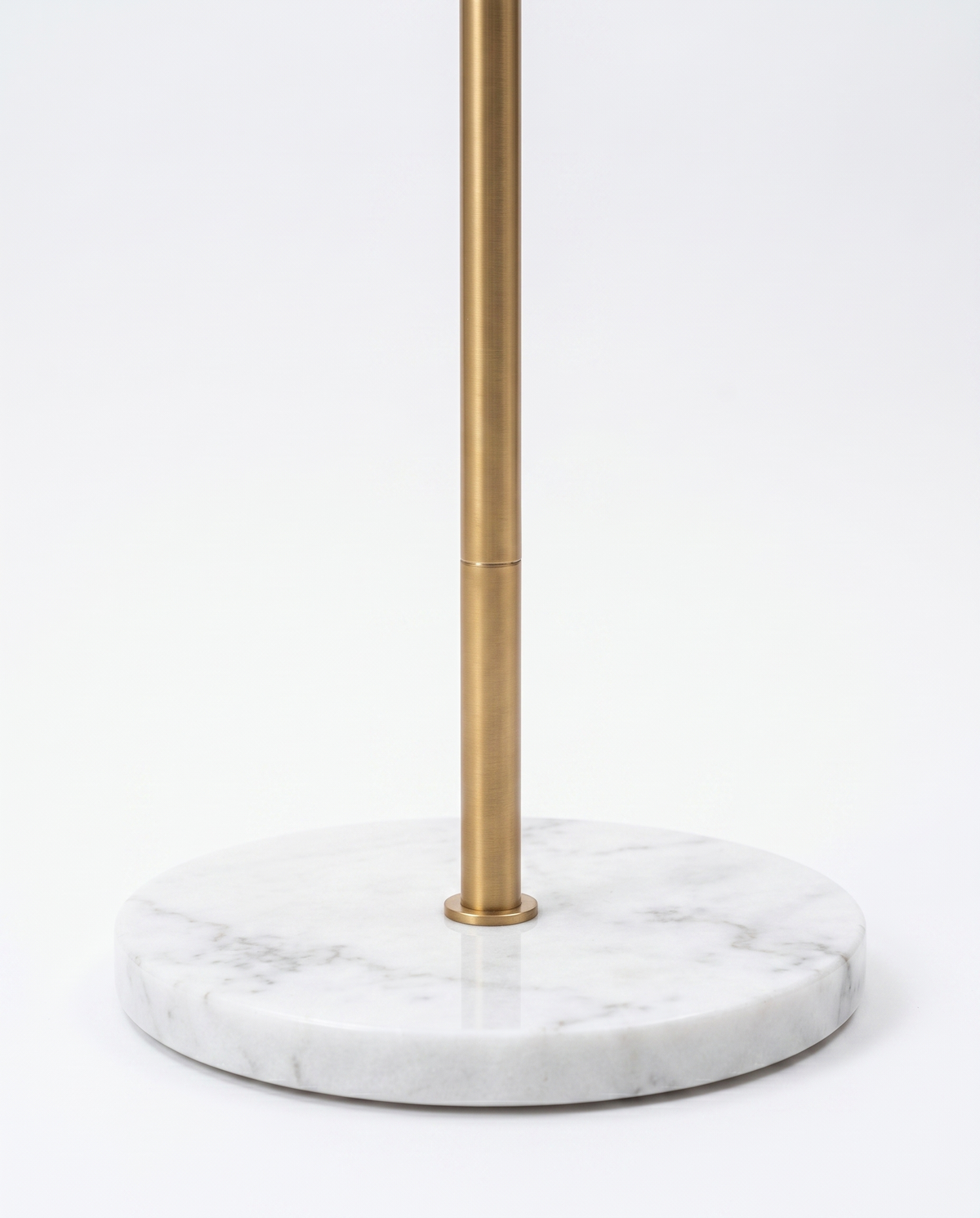 Arcadia marble base and brass pole, close-up on white