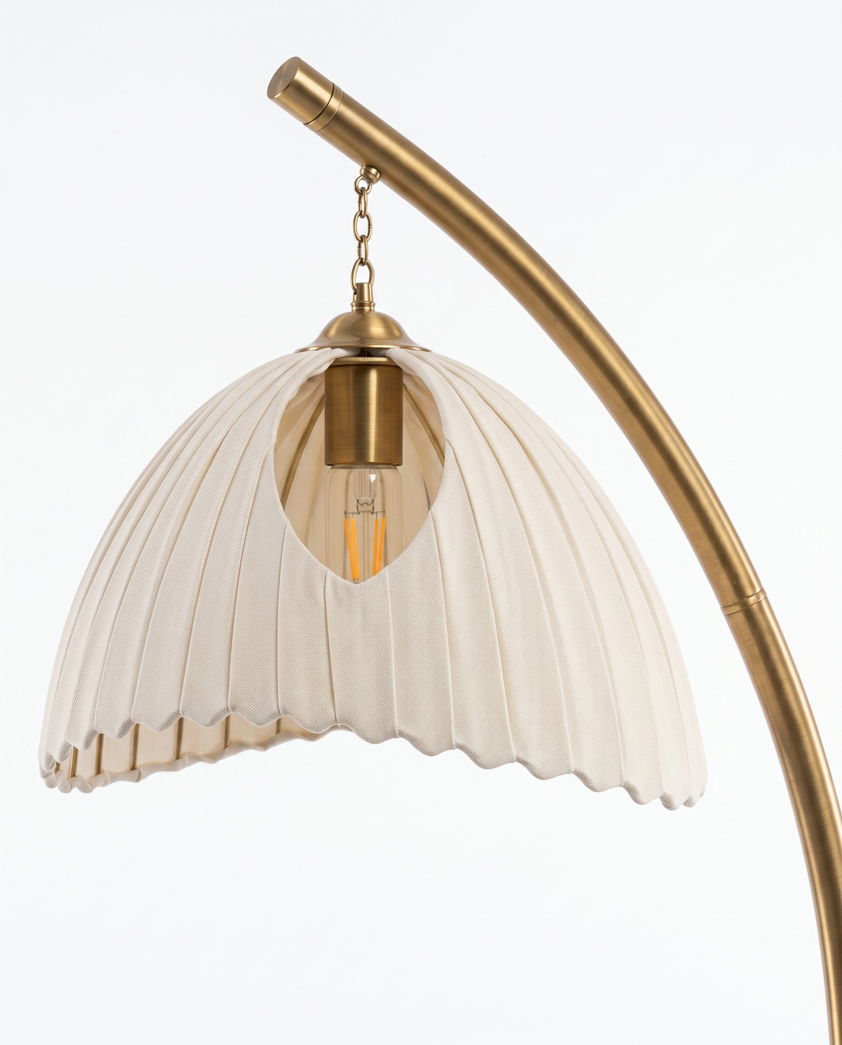 Arcadia brass arc and shade fitting, close-up on white