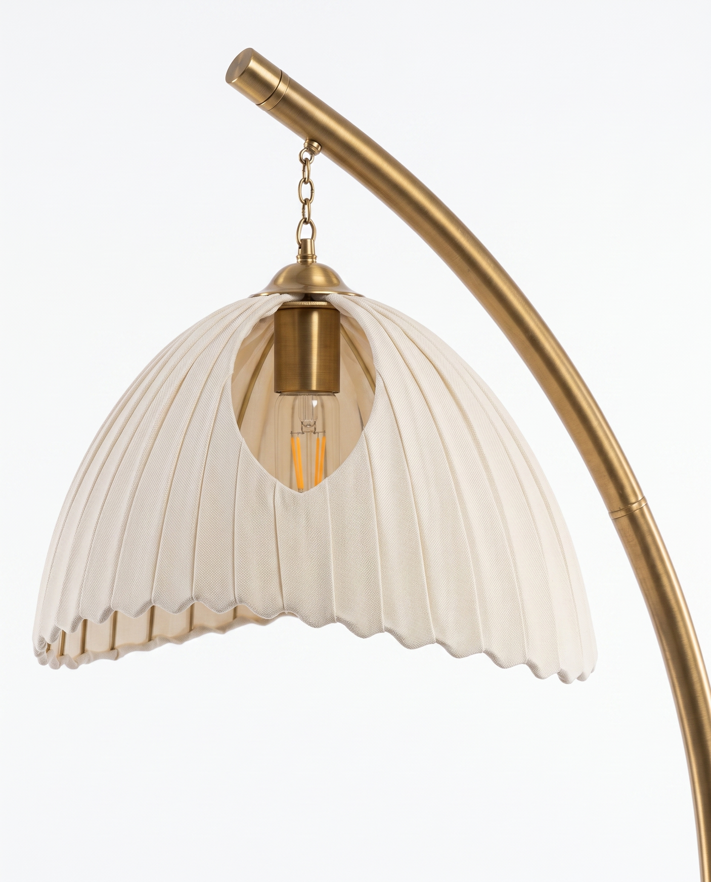 Arcadia brass arc and shade fitting, close-up on white
