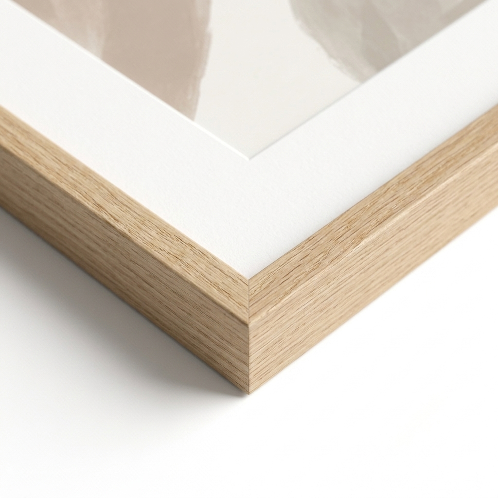 Slim natural-oak frame corner and white mat detail