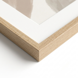 Slim natural-oak frame corner and white mat detail