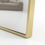 Slim brushed-gold frame edge profile detail
