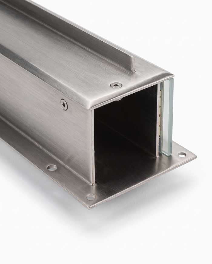 Rill stainless steel channel and mounting flange, close-up on white