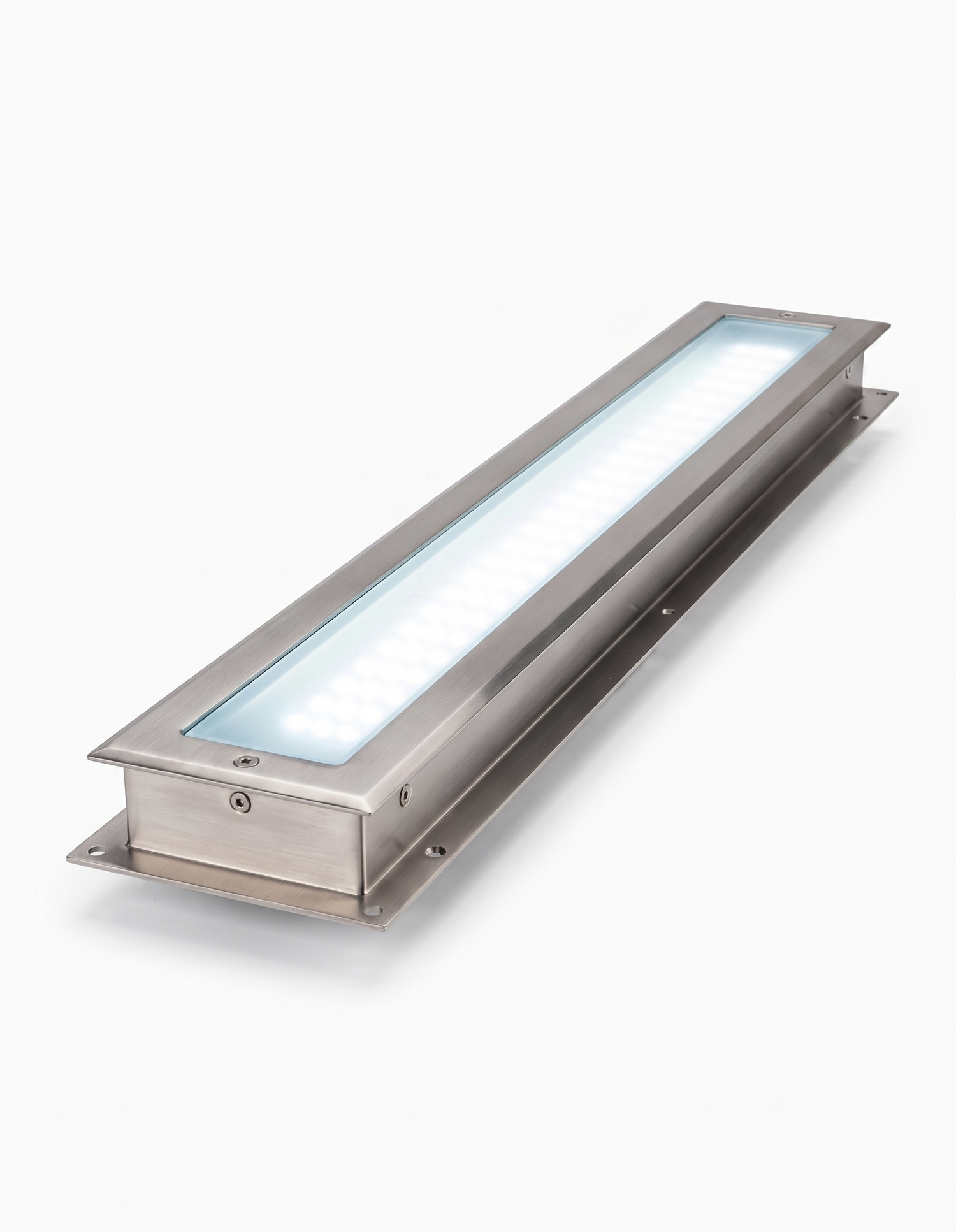 Rill in-ground LED strip light glowing cool white on white studio background