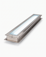Rill in-ground LED strip light glowing cool white on white studio background