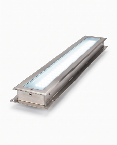 Rill in-ground LED strip light glowing cool white on white studio background