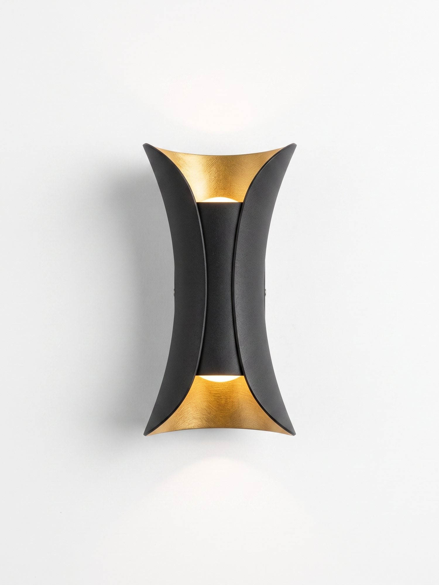 Curved up/down wall sconce, black with gold reflector, studio on white