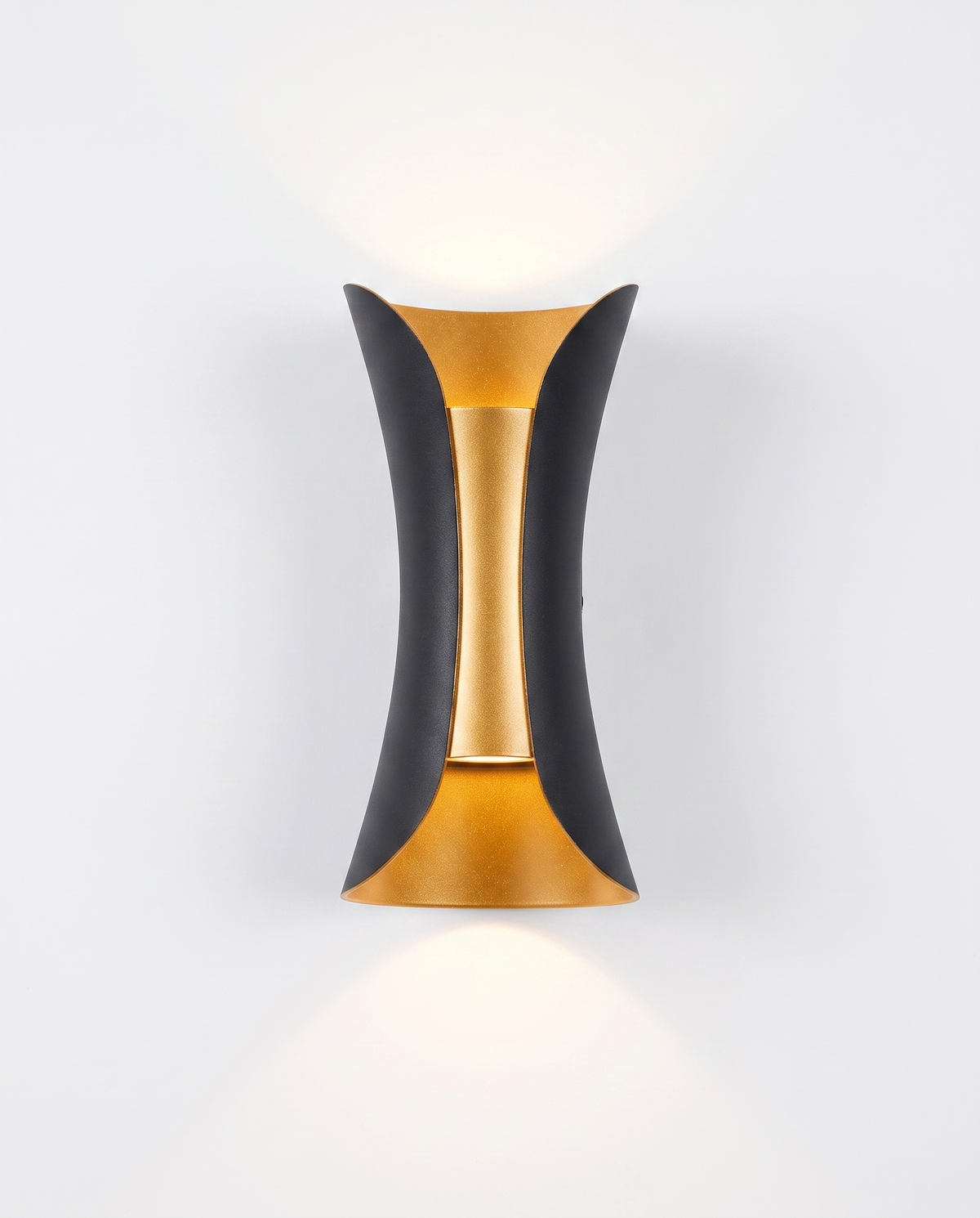 Marlow curved up/down wall sconce, black with gold reflector, studio on white