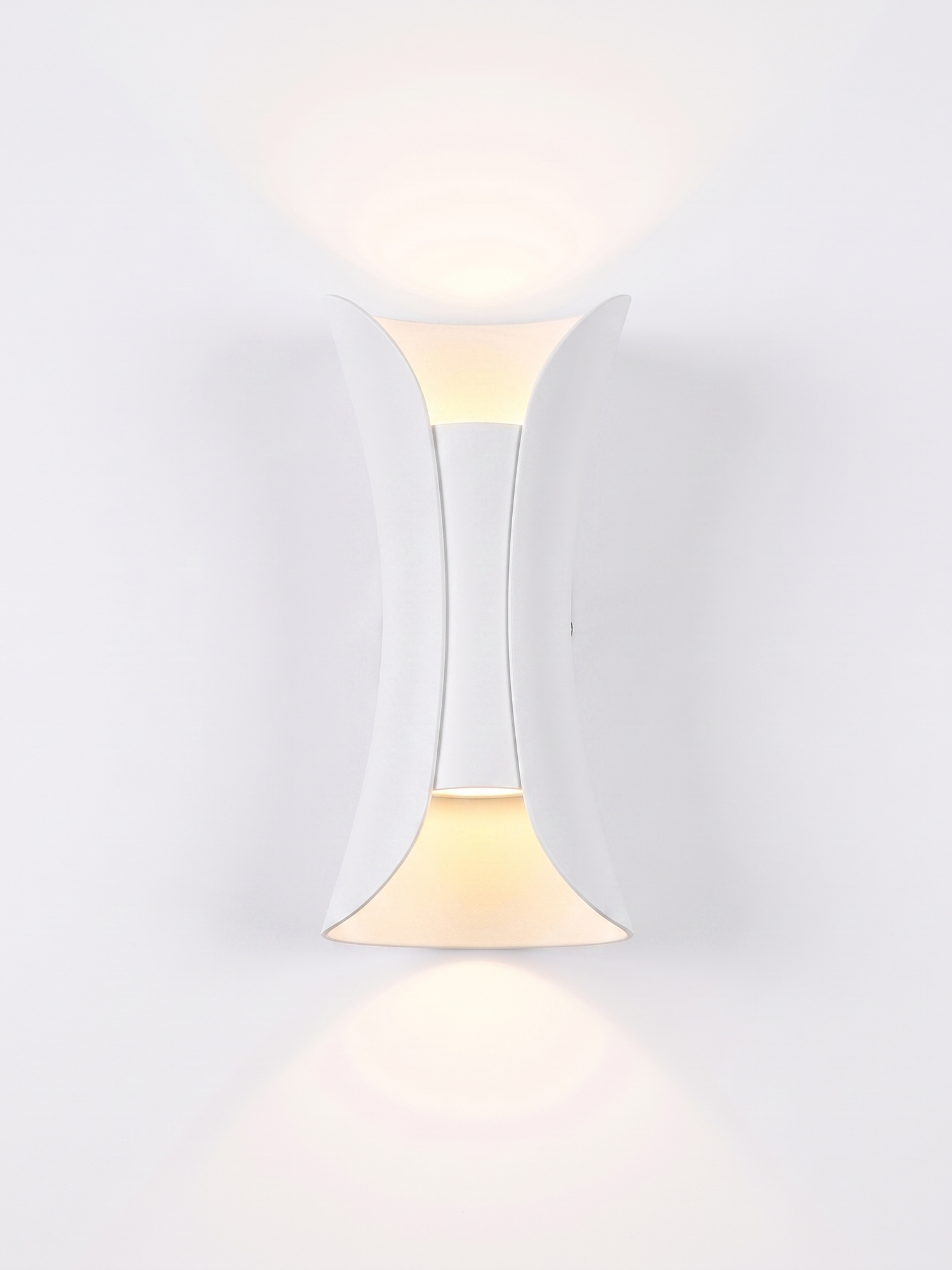 Marlow curved wall sconce, pure white finish, studio on white