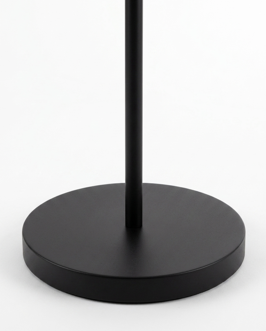 Dara arc floor lamp round weighted base and pole detail — studio white