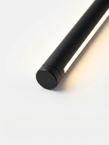 Close-up of the integrated LED glowing warm 3000K along the slim rod