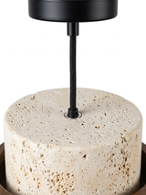 Close-up of the black cord and canopy meeting the top of the travertine shade