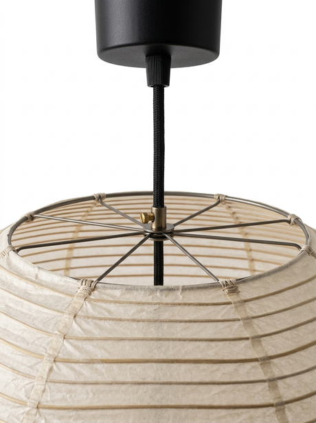 Close-up of the ceiling canopy and wire frame at the top of the paper lantern