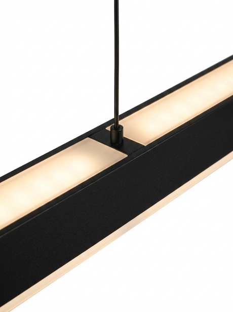 Close-up of the up-light glow at the top of the linear pendant