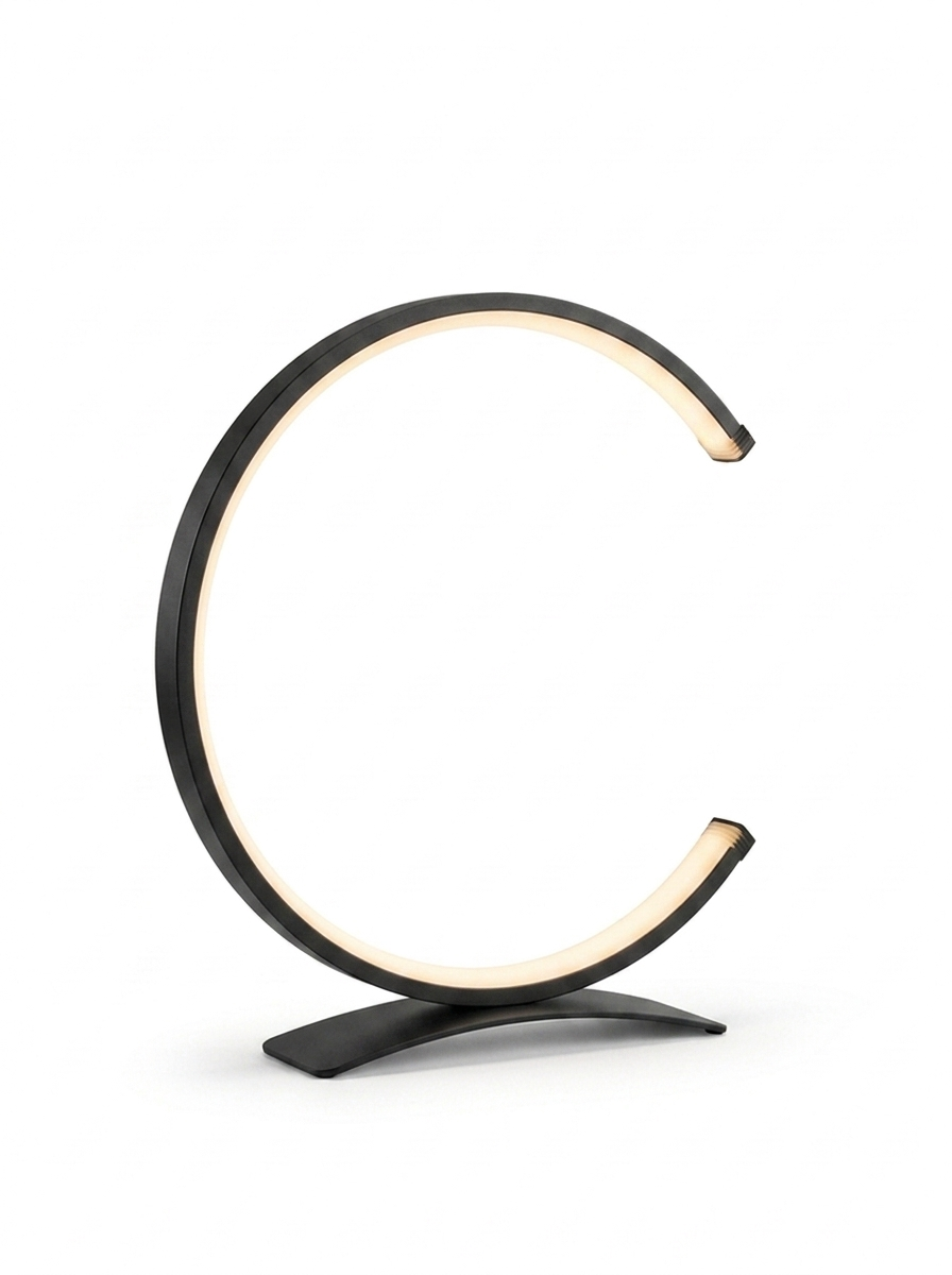 Fenn C-shaped LED ring table lamp in matte black on a studio white background