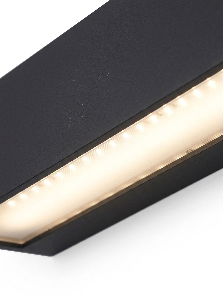 Close-up of the acrylic diffuser glowing warm along the length