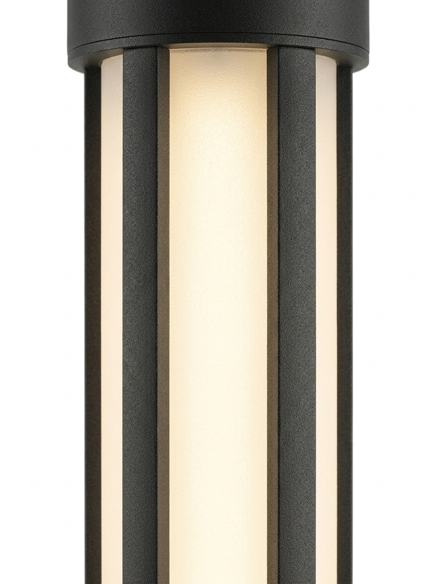 Close-up of the frosted diffuser cylinder glowing warm white 3000K