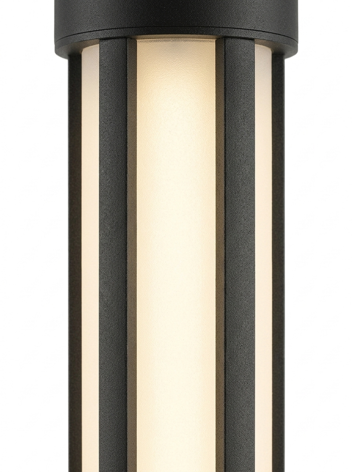 Close-up of the frosted diffuser cylinder glowing warm white 3000K