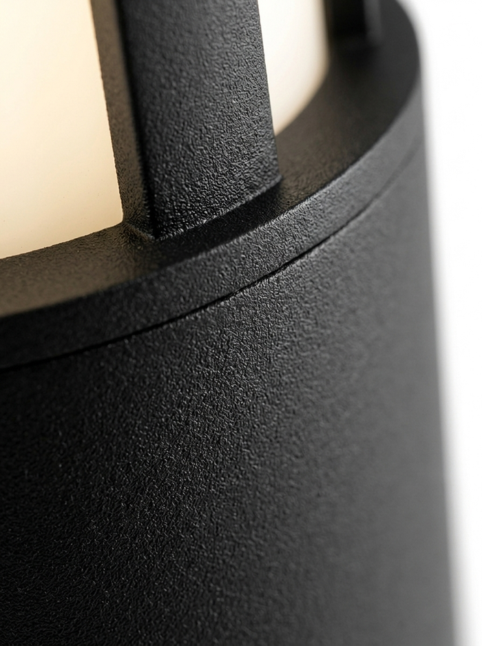 Macro of the matte-black powder-coat aluminum texture