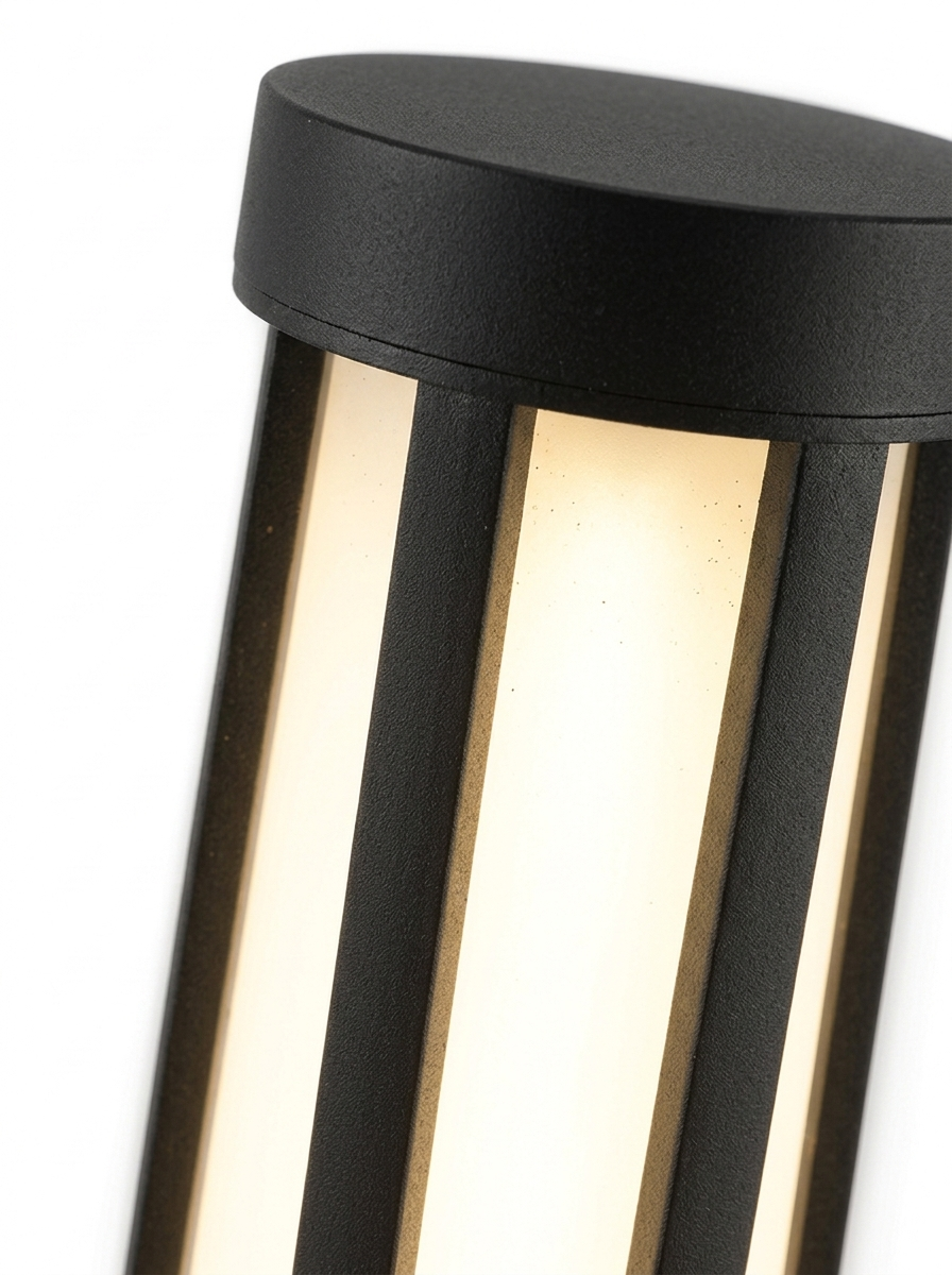 Three-quarter close-up of the glowing top section and cap