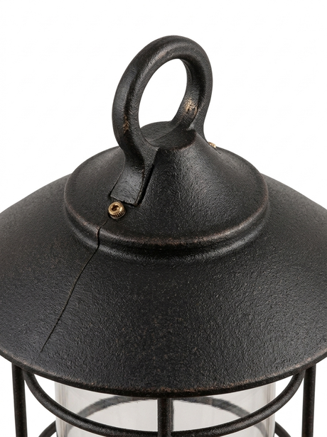 Close-up of the domed metal top cap and hanging loop