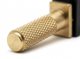 Ansel knurled brass toggle lever close-up