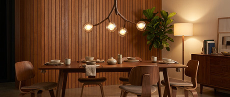 Thorne branch chandelier over a mid-century dining table — lifestyle