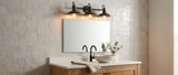 Doria 3-light vanity light over a mirror in a warm farmhouse bathroom — lifestyle