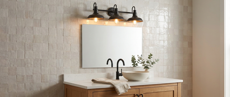 Doria 3-light vanity light over a mirror in a warm farmhouse bathroom — lifestyle