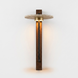 Vero wall sconce, front studio view glowing warm