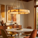 Aura chandelier over a mid-century dining table