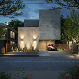 Ilse concrete up-down wall lights, pair on a raw-concrete contemporary home