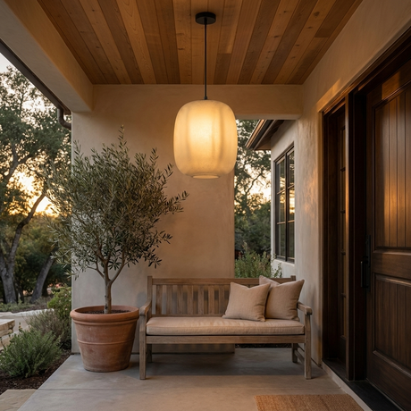 Runa outdoor pendant on a covered front porch at dusk — lifestyle