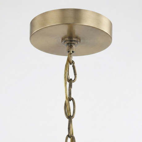 Kerri soft gold cage pendant — canopy and adjustable chain detail on white