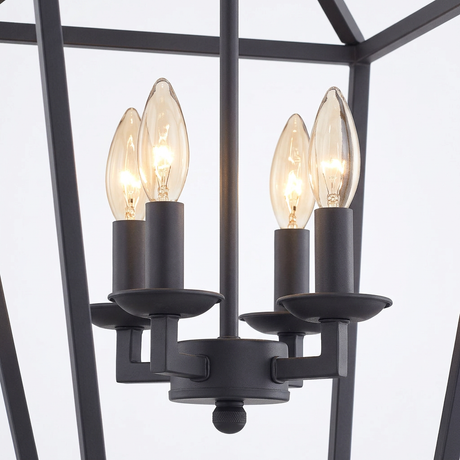 Kerri matte black cage pendant — four candelabra cluster detail on white
