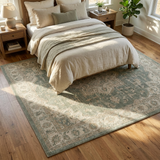 Wrenna sage medallion rug in a cozy bedroom — lifestyle
